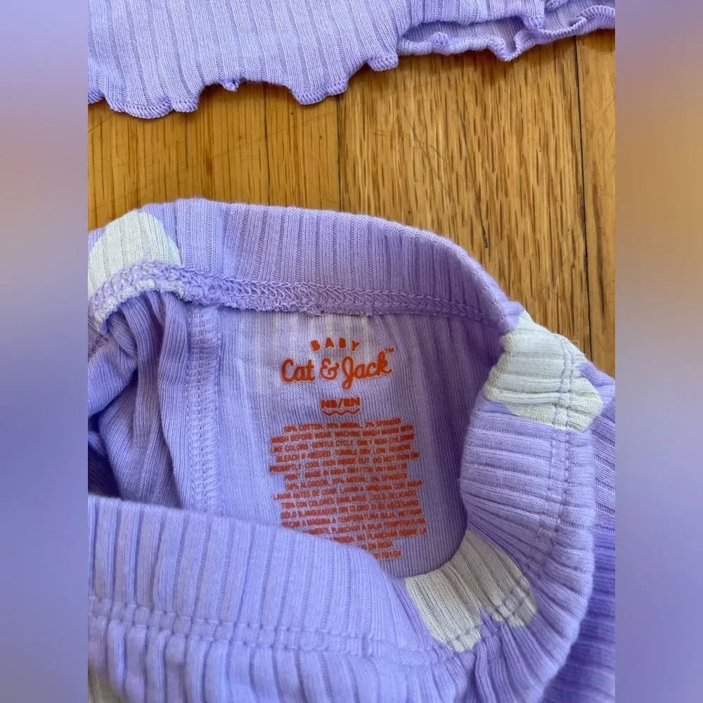 Newborn outfits one is carters one is cat and jack